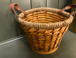 Basket with brown handles