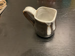 Brown/white cup