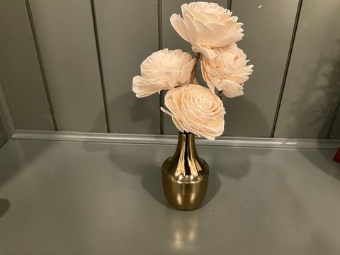 Wood flowers with gold vase